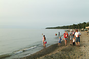 Families on the beach at Sara's Campground, Erie, Pennsylvania.